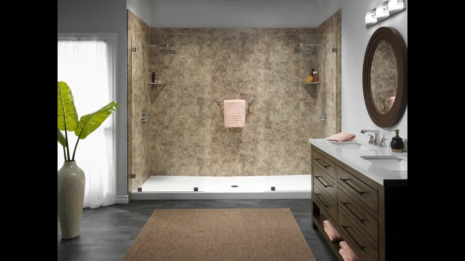 Modern bathroom with a spacious, earthy-toned shower, dual sinks, and wood cabinets. A large plant graces the corner, adding a fresh touch.