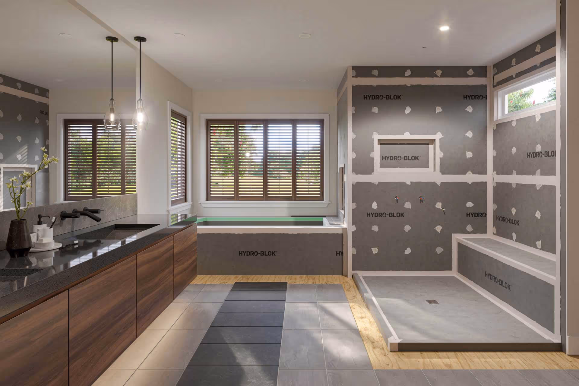Modern bathroom under renovation, featuring tiled floors, a large window with blinds, and partially installed shower and bathtub with exposed wall panels.